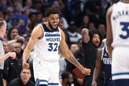 Minnesota Timberwolves center Karl-Anthony Towns (32) reacts during the fourth quarter against the Dallas Mavericks in game four of the western conference finals for the 2024 NBA playoffs at American Airlines Center.