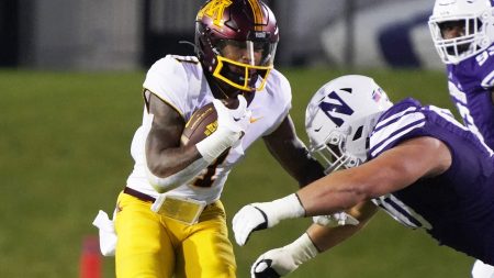 Sep 23, 2023; Evanston, Illinois, USA; Minnesota Golden Gophers running back Darius Taylor (1) runs against the Northwestern Wildcats during the first quarter at Ryan Field.