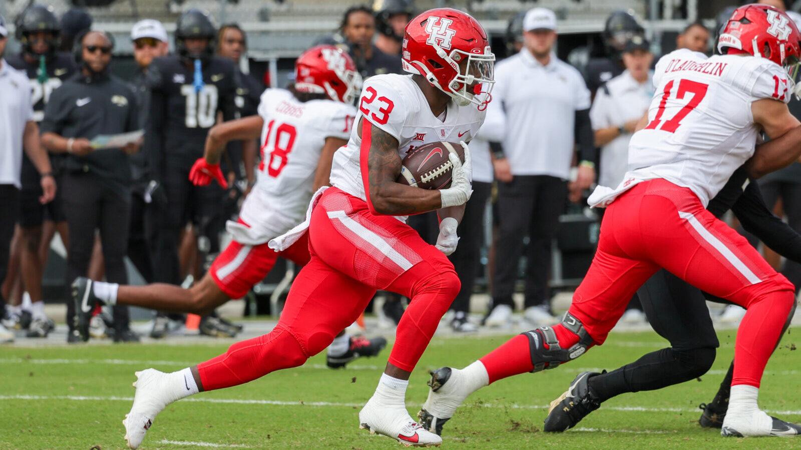 Nov 25, 2023; Orlando, Florida, USA; Houston Cougars running back Parker Jenkins (23) carries the ball during the first quarter against the UCF Knights at FBC Mortgage Stadium.