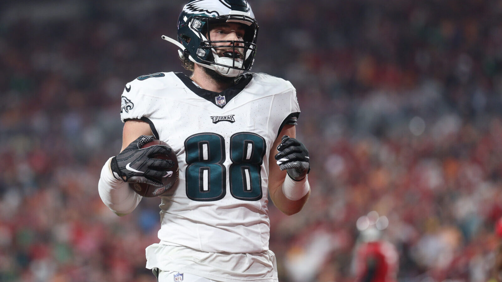 Jan 15, 2024; Tampa, Florida, USA; Philadelphia Eagles tight end Dallas Goedert (88) scores a touchdown against the Tampa Bay Buccaneers after a reception during the first half of a 2024 NFC wild card game at Raymond James Stadium.