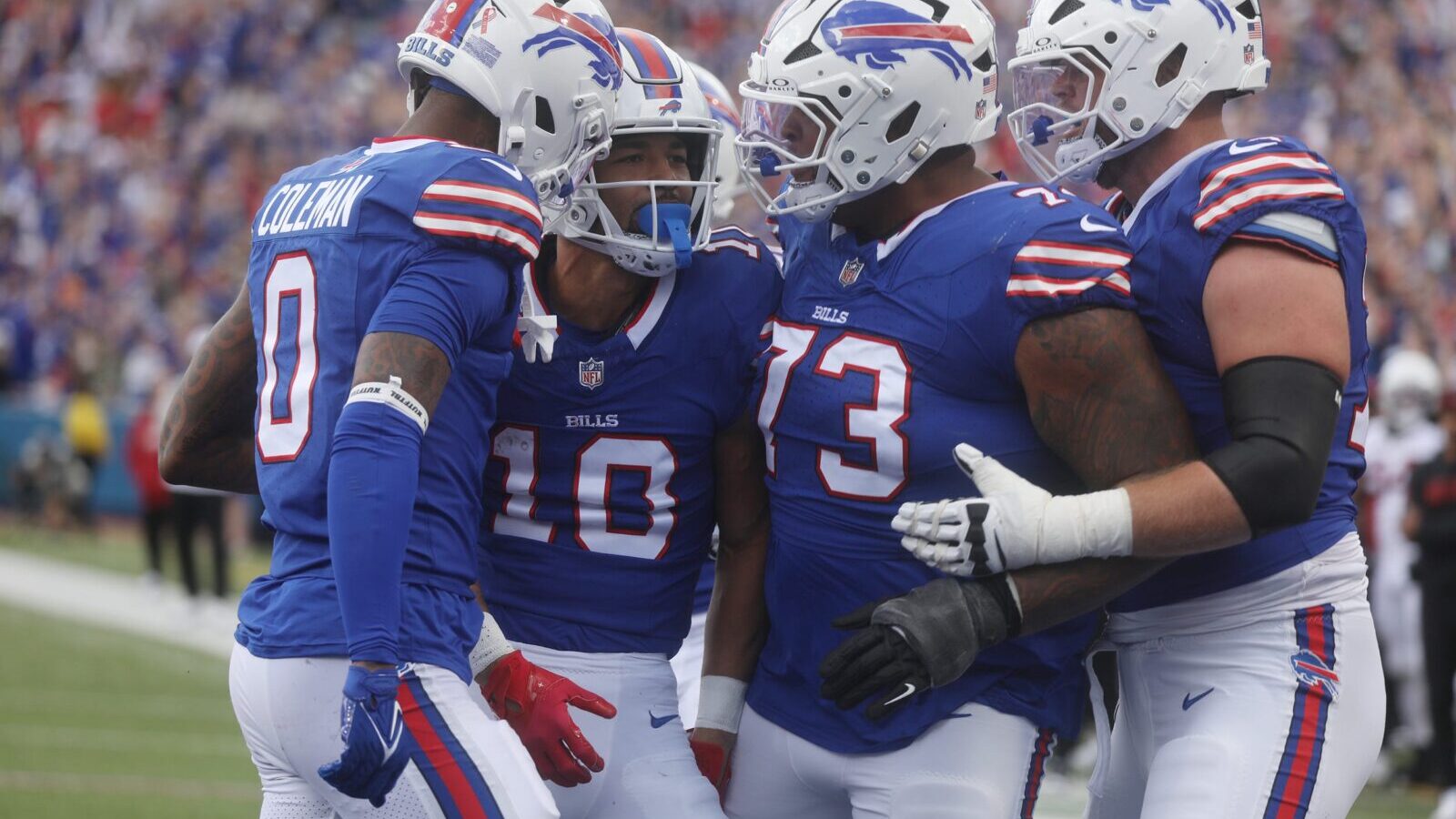 Bills Khalil Shakir is congratulated by teammates Keon Coleman, Dion Dawkins and Spencer Brown on his touchdown catch during the third quarter at Highmark Stadium in Orchard Park on Sept. 8, 2024.