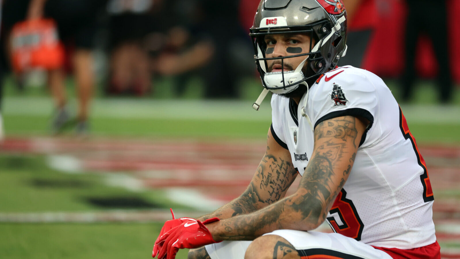 Aug 23, 2024; Tampa, Florida, USA; Tampa Bay Buccaneers wide receiver Mike Evans (13) looks on before the game against the Miami Dolphins at Raymond James Stadium. Mandatory