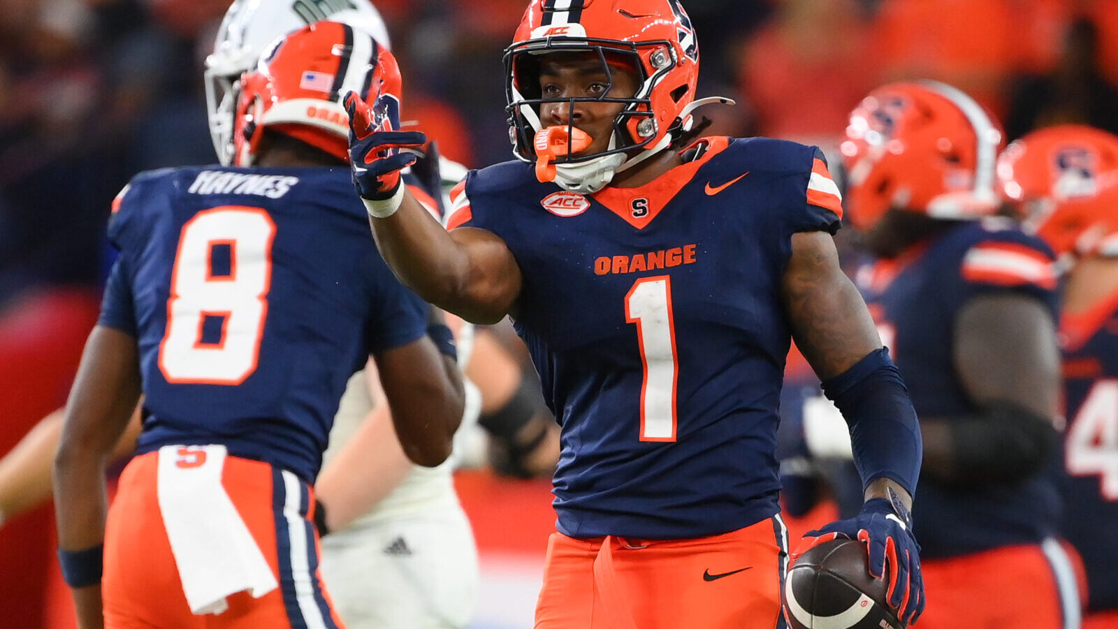 Aug 31, 2024; Syracuse, New York, USA; Syracuse Orange running back LeQuint Allen (1) gestures after a first down against the Ohio Bobcats during the second half at the JMA Wireless Dome.
