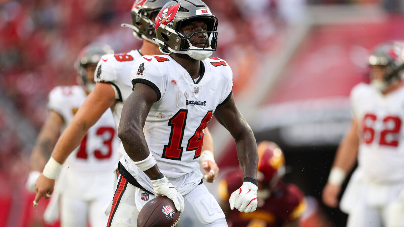 Sep 8, 2024; Tampa, Florida, USA; Tampa Bay Buccaneers wide receiver Chris Godwin (14) reacts after a play against the Washington Commanders in the fourth quarter at Raymond James Stadium.