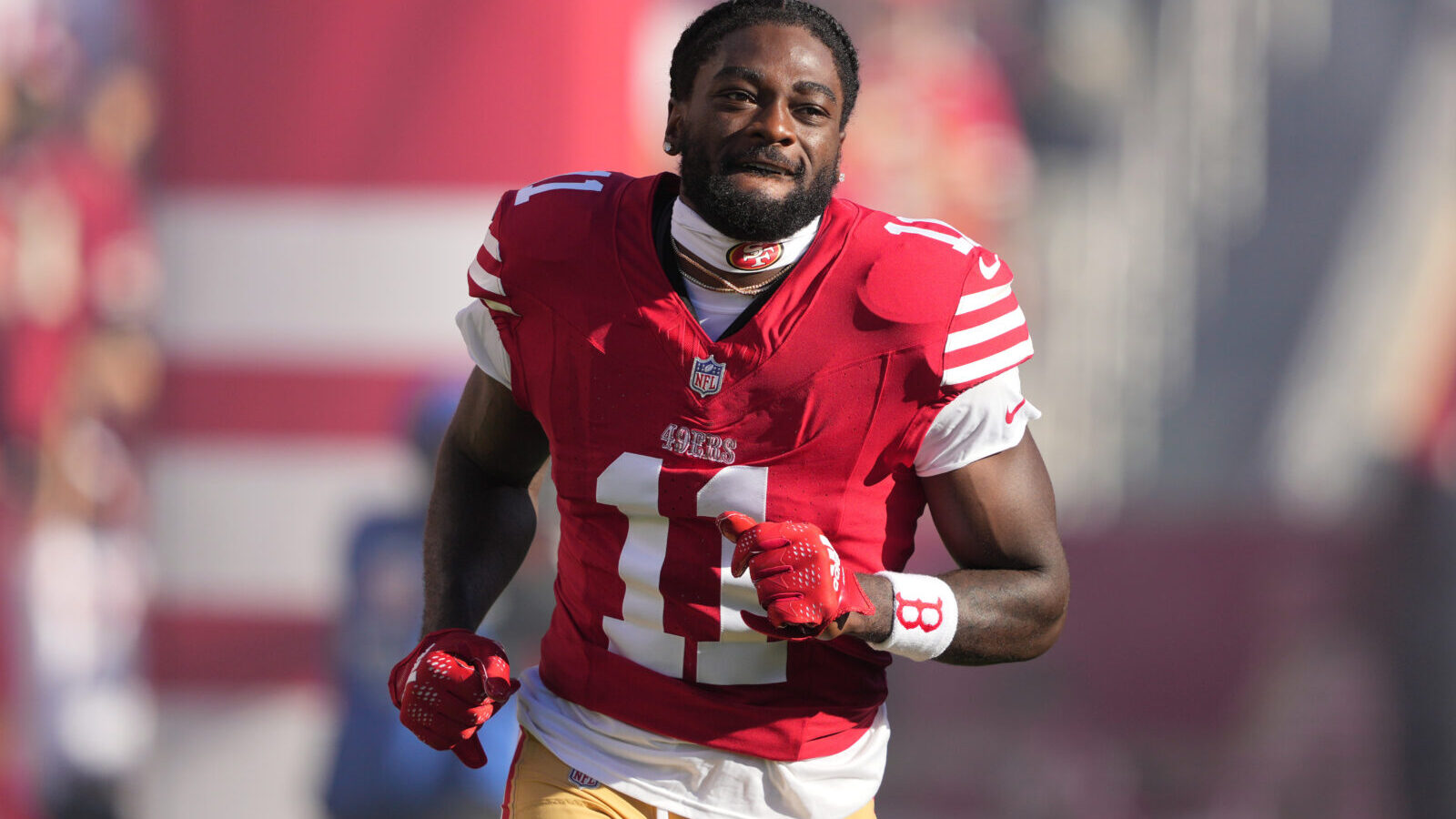 Sep 9, 2024; Santa Clara, California, USA; San Francisco 49ers wide receiver Brandon Aiyuk (11) is introduced to the crowd before the game against the New York Jets at Levi's Stadium.