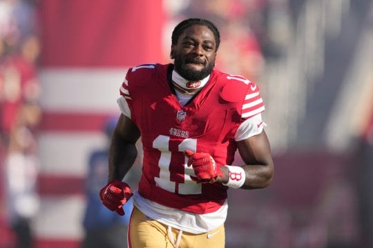 Sep 9, 2024; Santa Clara, California, USA; San Francisco 49ers wide receiver Brandon Aiyuk (11) is introduced to the crowd before the game against the New York Jets at Levi's Stadium.