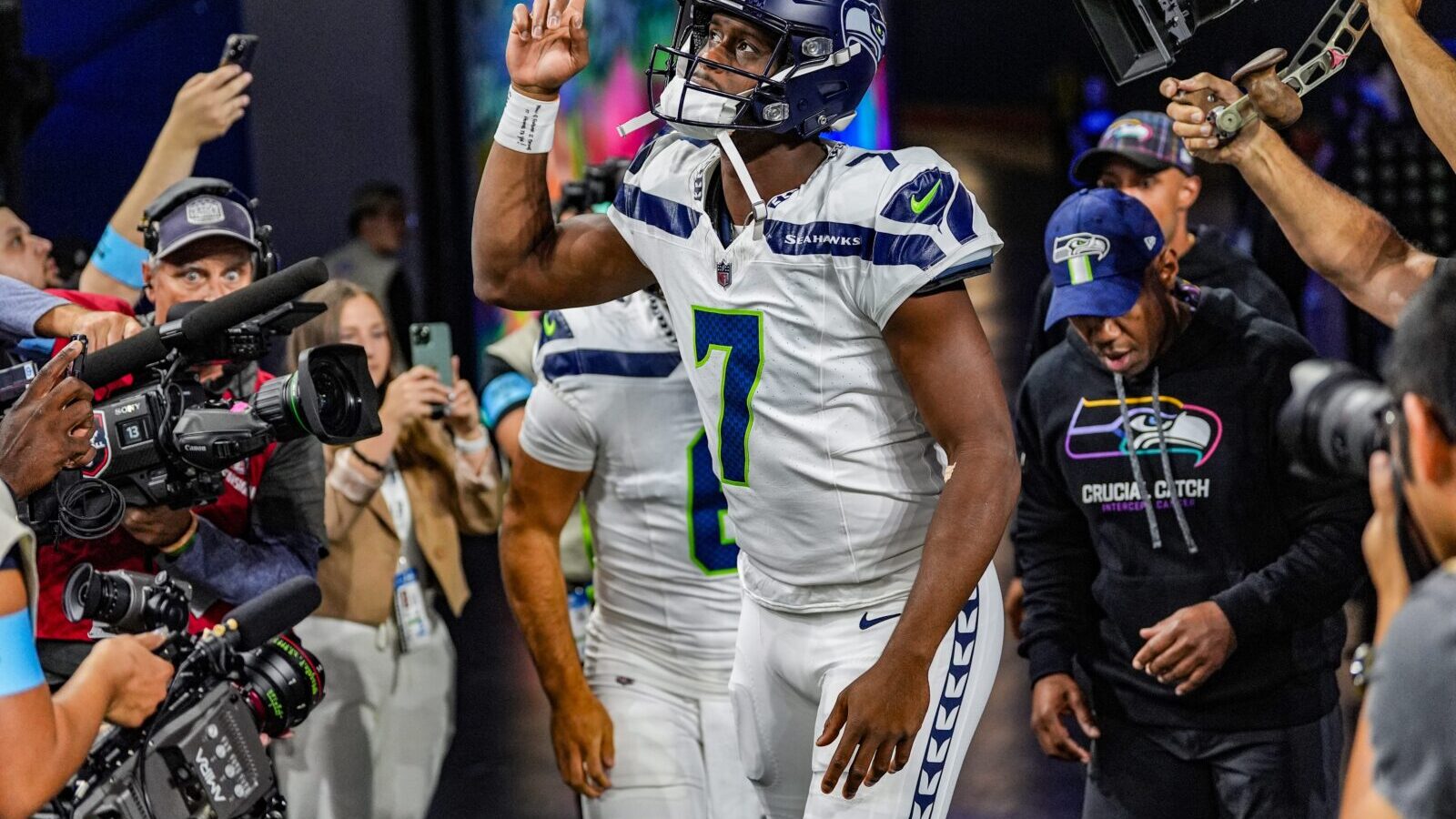 Seattle Seahawks quarterback Geno Smith (7) runs out onto the field during the pregame for the N.F.L. game between the Detroit Lions and the Seattle Seahawks at Ford Field in Detroit, Monday, Sept. 30, 2024.