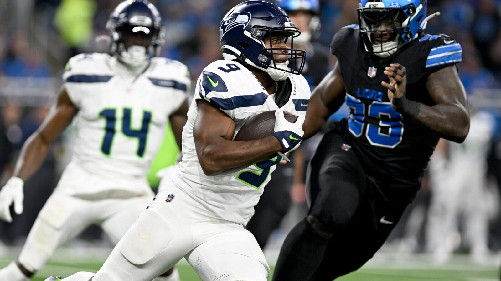 Sep 30, 2024; Detroit, Michigan, USA; Seattle Seahawks running back Kenneth Walker III (9) runs the ball against the Detroit Lions in the fourth quarter at Ford Field.