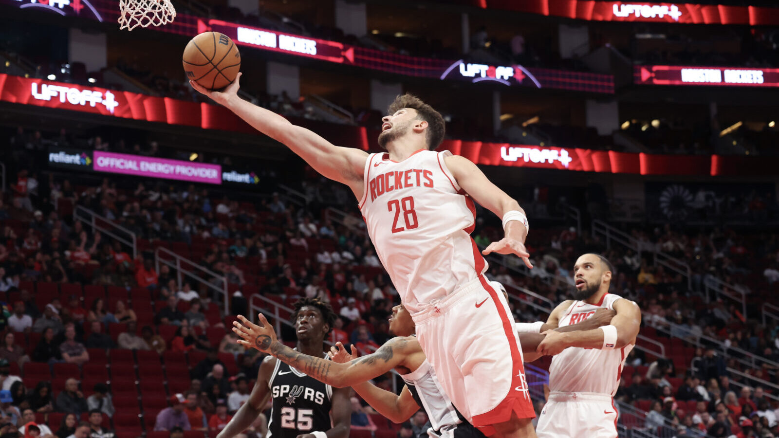 Oct 17, 2024; Houston, Texas, USA; Houston Rockets center Alperen Sengun (28) shoots against San Antonio Spurs guard Brandon Boston Jr. (4) in the fourth quarter at Toyota Center.