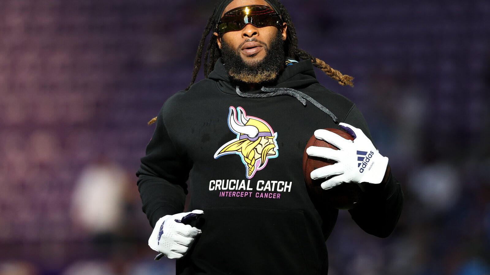 Oct 20, 2024; Minneapolis, Minnesota, USA; Minnesota Vikings running back Aaron Jones (33) warms up before the game against the Detroit Lions at U.S. Bank Stadium.