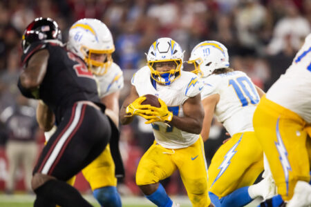 Oct 21, 2024; Glendale, Arizona, USA; Los Angeles Chargers running back J.K. Dobbins (27) against the Arizona Cardinals at State Farm Stadium.