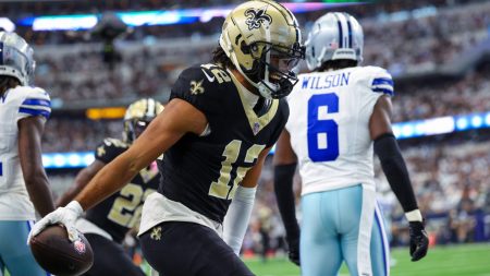 Sep 15, 2024; Arlington, Texas, USA; New Orleans Saints wide receiver Chris Olave (12) reacts during the first quarter against the Dallas Cowboys at AT&T Stadium.