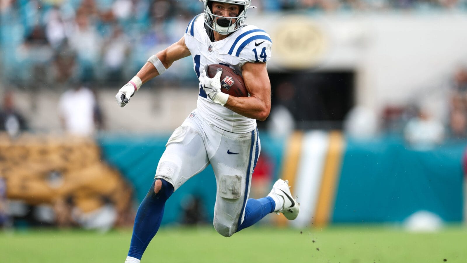 Oct 6, 2024; Jacksonville, Florida, USA; Indianapolis Colts wide receiver Alec Pierce (14) runs with the ball against the Jacksonville Jaguars in the fourth quarter at EverBank Stadium.