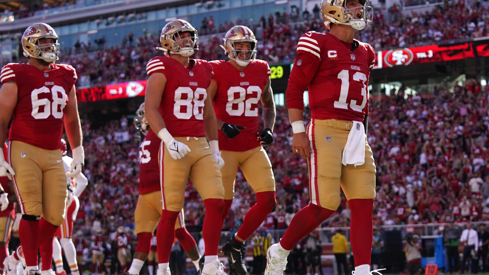 Oct 20, 2024; Santa Clara, California, USA; San Francisco 49ers quarterback Brock Purdy (13) reacts after rushing for a touchdown against the Kansas City Chiefs in the third quarter at Levi's Stadium.
