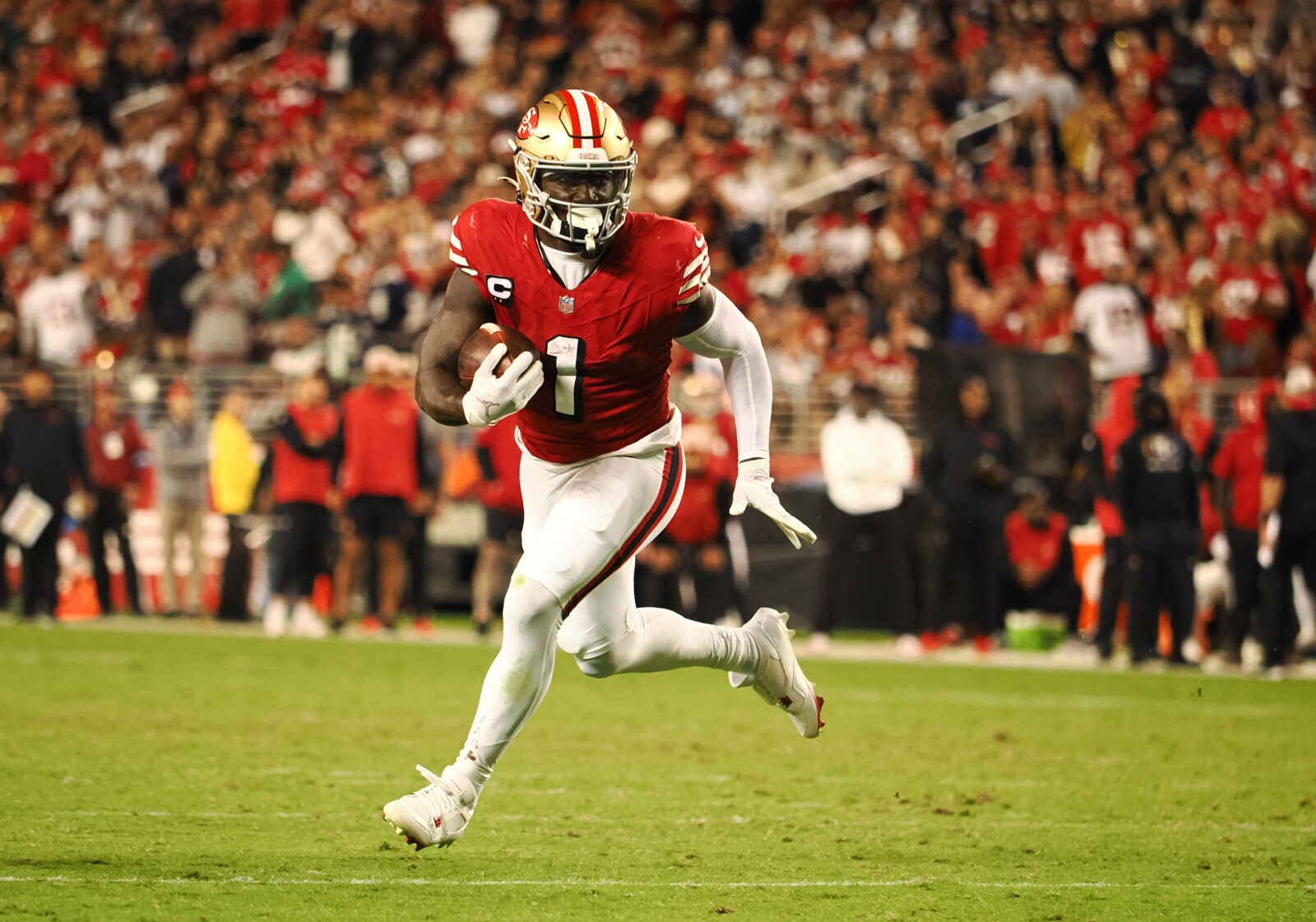 Oct 27, 2024; Santa Clara, California, USA; San Francisco 49ers wide receiver Deebo Samuel Sr (1) carries the ball against the Dallas Cowboys during the third quarter at Levi's Stadium.
