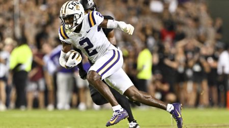 Oct 26, 2024; College Station, Texas, USA; LSU Tigers wide receiver Kyren Lacy (2) runs the ball against the Texas A&M Aggies during the second half. The Aggies defeated the Tigers 38-23; at Kyle Field.