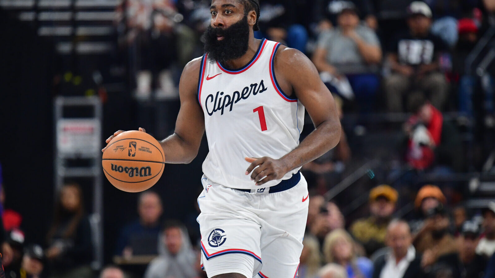Oct 31, 2024; Inglewood, California, USA; Los Angeles Clippers guard James Harden (1) controls the ball against the Phoenix Suns during the second half at Intuit Dome.