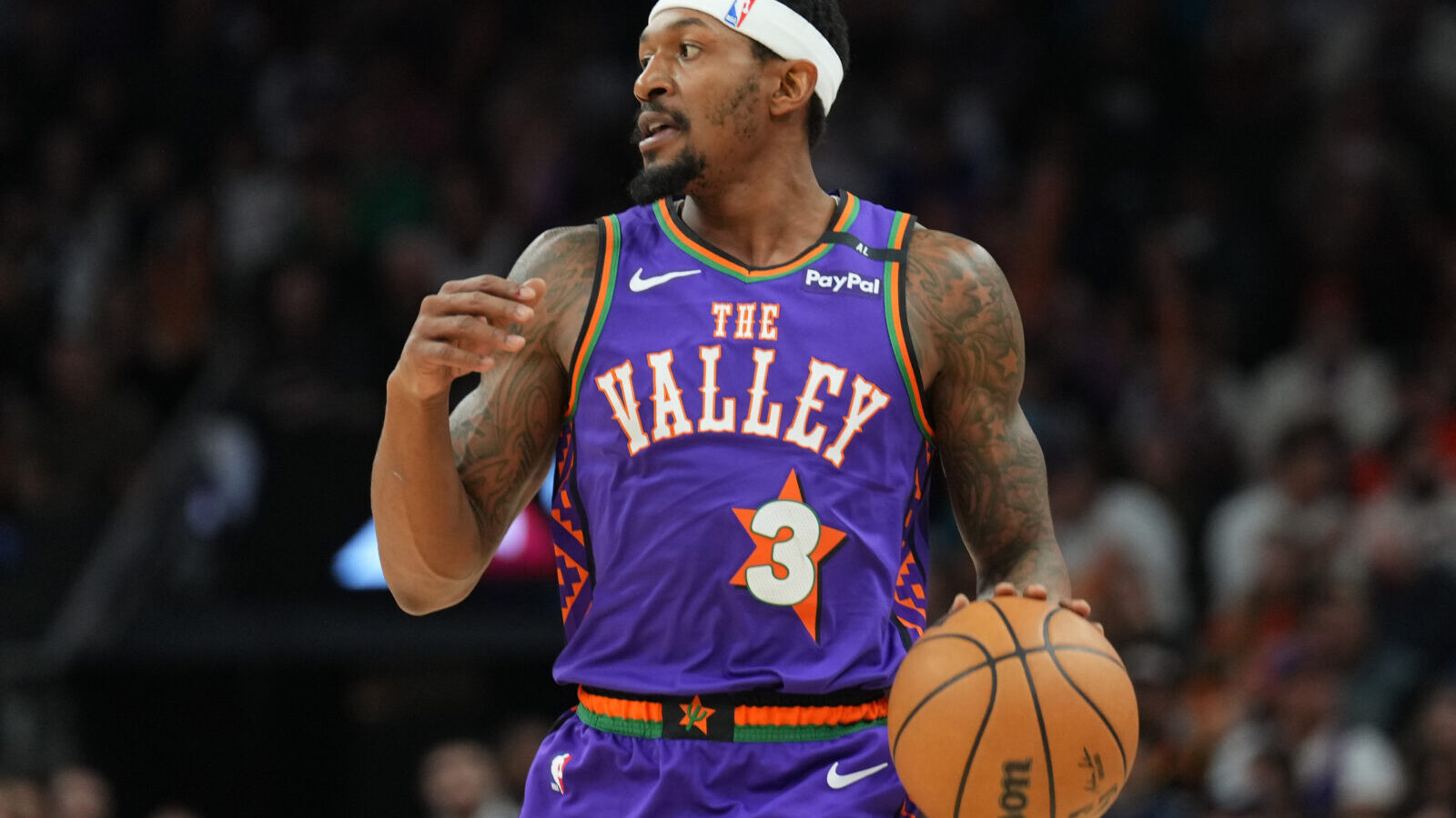 Dec 21, 2024; Phoenix, Arizona, USA; Phoenix Suns guard Bradley Beal (3) dribbles against the Detroit Pistons during the first half at Footprint Center.