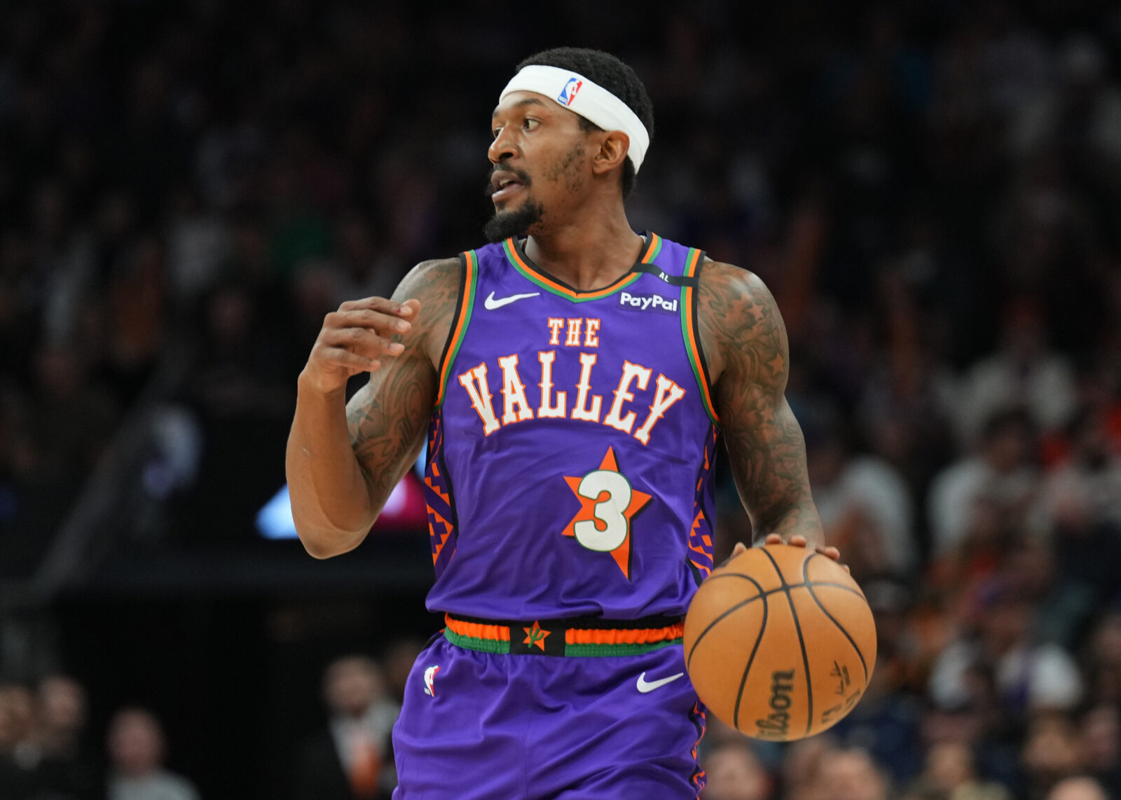 Dec 21, 2024; Phoenix, Arizona, USA; Phoenix Suns guard Bradley Beal (3) dribbles against the Detroit Pistons during the first half at Footprint Center.