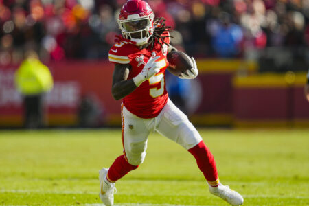 Dec 21, 2024; Kansas City, Missouri, USA; Kansas City Chiefs wide receiver Hollywood Brown (5) runs with the ball during the first half against the Houston Texans at GEHA Field at Arrowhead Stadium.