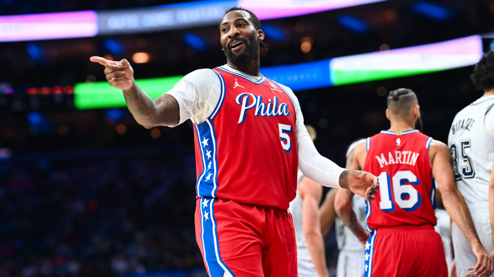 Dec 6, 2024; Philadelphia, Pennsylvania, USA; Philadelphia 76ers center Andre Drummond (5) reacts against the Orlando Magic in the second quarter at Wells Fargo Center.