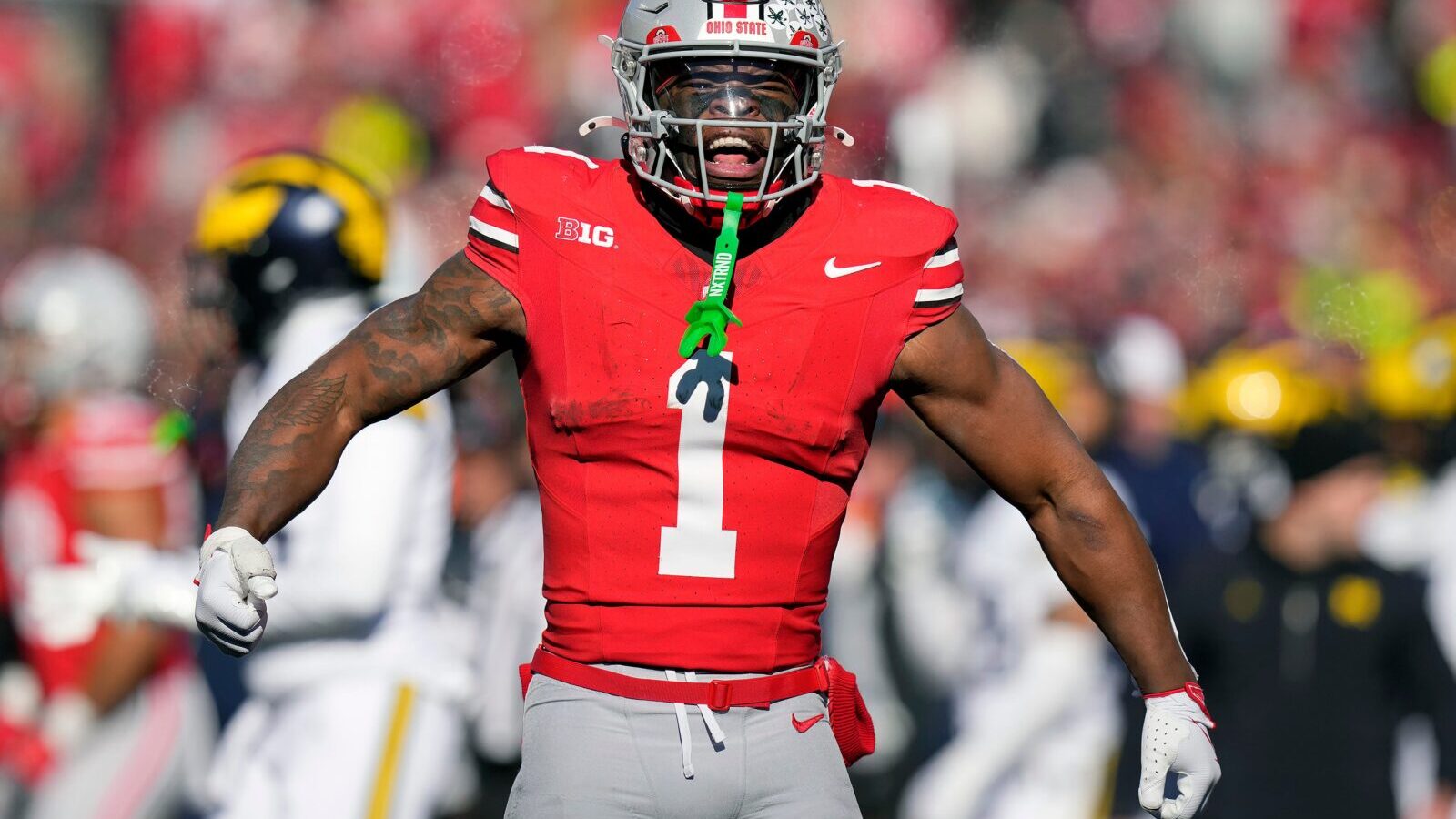 Ohio State Buckeyes running back Quinshon Judkins (1) celebrates after a first down run against Michigan Wolverines during the second quarter of the NCAA football game at Ohio Stadium in Columbus on Saturday, Nov. 30, 2024.