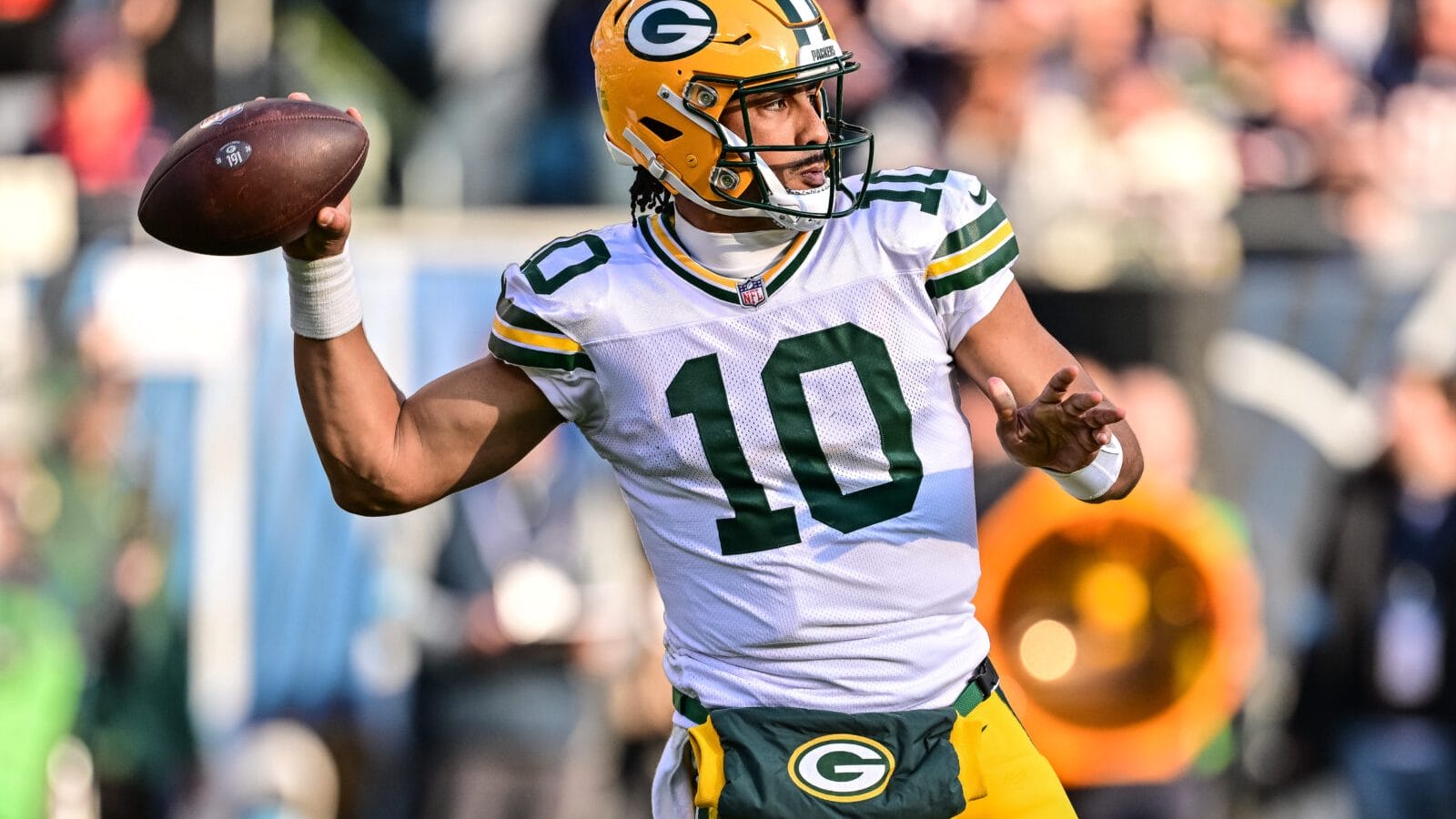 Nov 17, 2024; Chicago, Illinois, USA; Green Bay Packers quarterback Jordan Love (10) passes the ball against the Chicago Bears during the third quarter at Soldier Field.