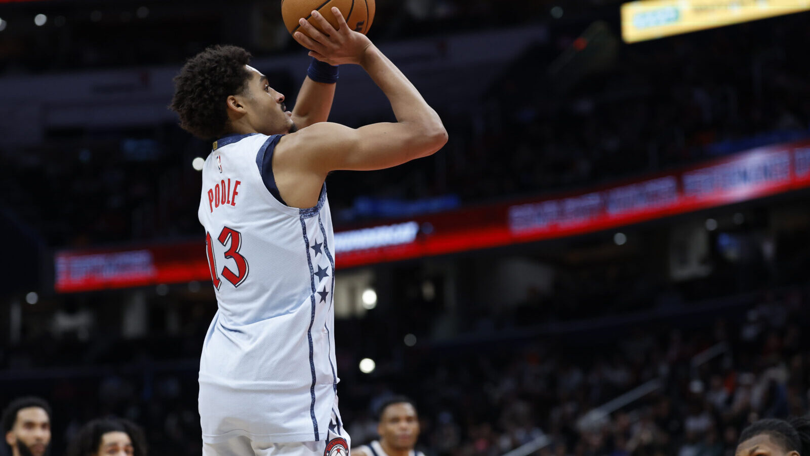 Dec 7, 2024; Washington, District of Columbia, USA; Washington Wizards guard Jordan Poole (13) shoots the ball against the Denver Nuggets in the fourth quarter at Capital One Arena.