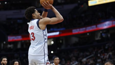 Dec 7, 2024; Washington, District of Columbia, USA; Washington Wizards guard Jordan Poole (13) shoots the ball against the Denver Nuggets in the fourth quarter at Capital One Arena.