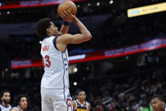 Dec 7, 2024; Washington, District of Columbia, USA; Washington Wizards guard Jordan Poole (13) shoots the ball against the Denver Nuggets in the fourth quarter at Capital One Arena.