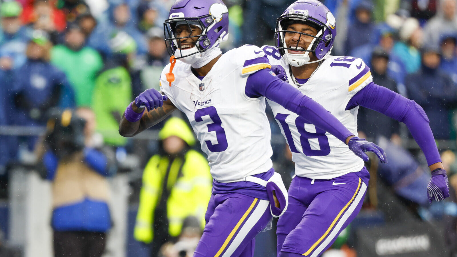 Dec 22, 2024; Seattle, Washington, USA; Minnesota Vikings wide receiver Jordan Addison (3) celebrates with wide receiver Justin Jefferson (18) after catching a touchdown pass against the Seattle Seahawks during the first quarter at Lumen Field.