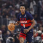 Jan 10, 2025; Chicago, Illinois, USA; Washington Wizards guard Carlton Carrington (8) brings the ball up court against the Chicago Bulls during the second half at United Center.