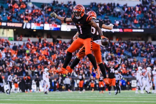 Dec 22, 2024; Cincinnati, Ohio, USA; Cincinnati Bengals wide receiver Ja'Marr Chase (1) reacts with wide receiver Jermaine Burton (81) after scoring a touchdown in the second half against the Cleveland Browns at Paycor Stadium.