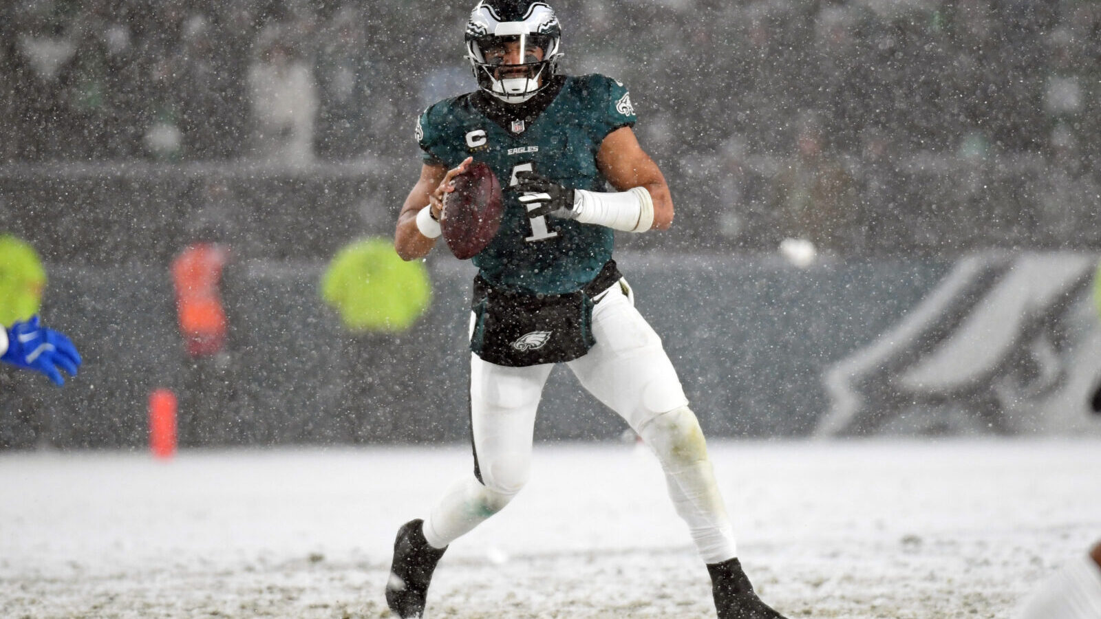 Jan 19, 2025; Philadelphia, Pennsylvania, USA; Philadelphia Eagles quarterback Jalen Hurts (1) looks for a receiver during the fourth quarter against the Los Angeles Rams in a 2025 NFC divisional round game at Lincoln Financial Field.