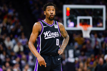 Jan 16, 2025; Sacramento, California, USA; Sacramento Kings guard Malik Monk (0) reacts after a play during the fourth quarter against the Houston Rockets at Golden 1 Center.