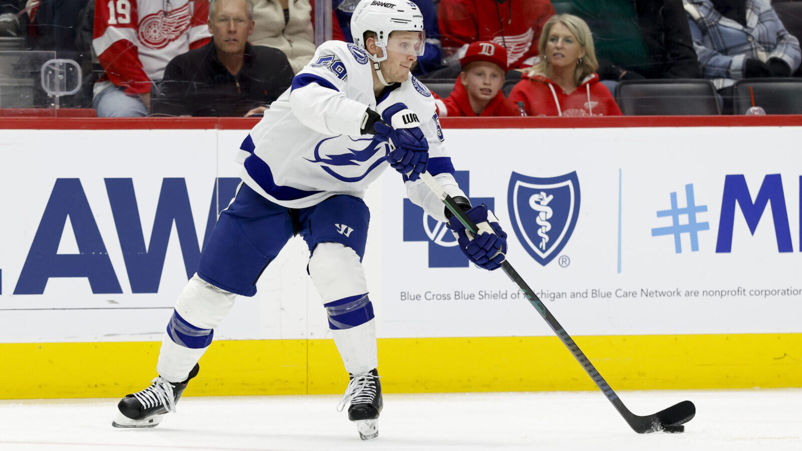 Feb 8, 2025; Detroit, Michigan, USA; Tampa Bay Lightning center Jake Guentzel (59) skates with the puck in the third period against the Detroit Red Wings at Little Caesars Arena.