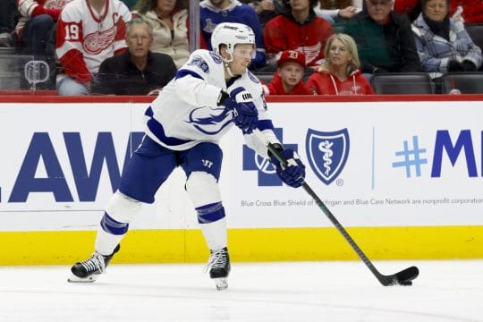 Feb 8, 2025; Detroit, Michigan, USA; Tampa Bay Lightning center Jake Guentzel (59) skates with the puck in the third period against the Detroit Red Wings at Little Caesars Arena.