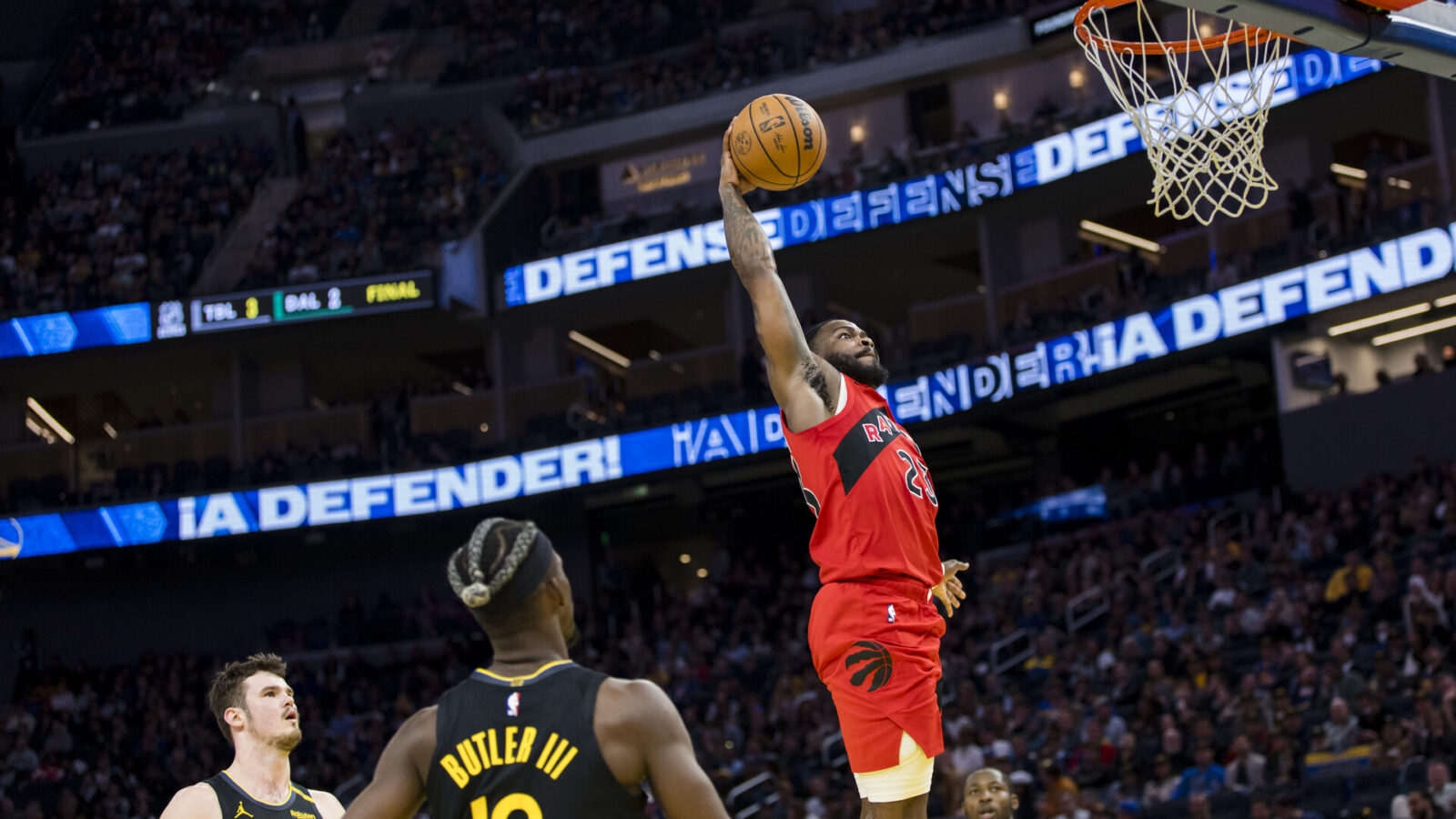 Mar 20, 2025; San Francisco, California, USA; Toronto Raptors guard Jamal Shead (23) dunks the ball against the Golden State Warriors during the third quarter at Chase Center.