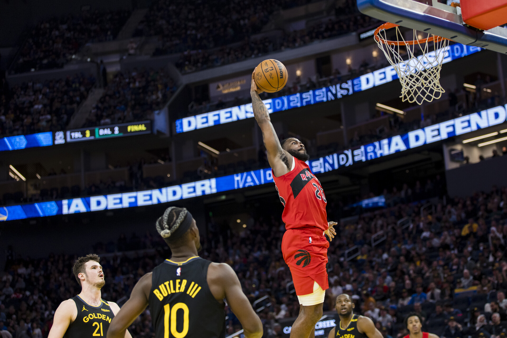 Mar 20, 2025; San Francisco, California, USA; Toronto Raptors guard Jamal Shead (23) dunks the ball against the Golden State Warriors during the third quarter at Chase Center.