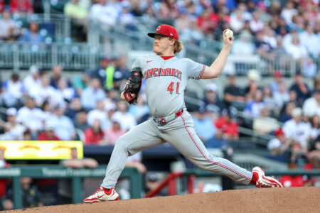 May 6, 2025; Cumberland, Georgia, USA; Cincinnati Reds pitcher Andrew Abbott (41) pitches the ball against the Atlanta Braves during the first inning at Truist Park.