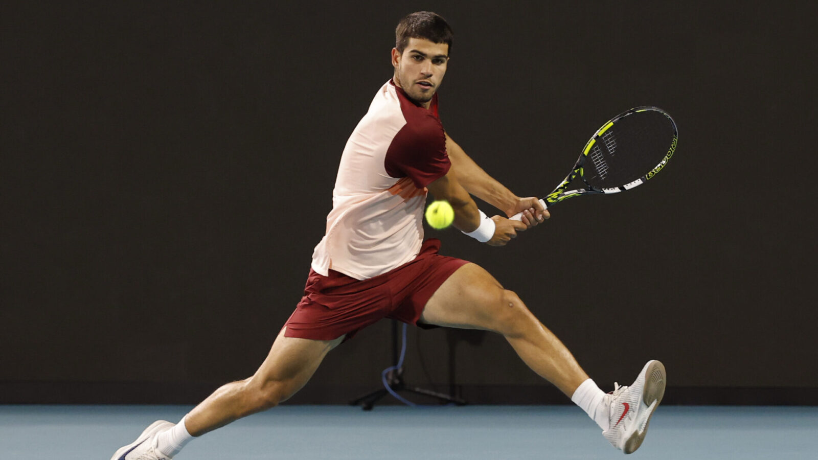 Mar 21, 2025; Miami, FL, USA; Carlos Alcaraz (ESP) reaches for a backhand against David Goffin (BEL)(not pictured) on day four of the Miami Open at Hard Rock Stadium.