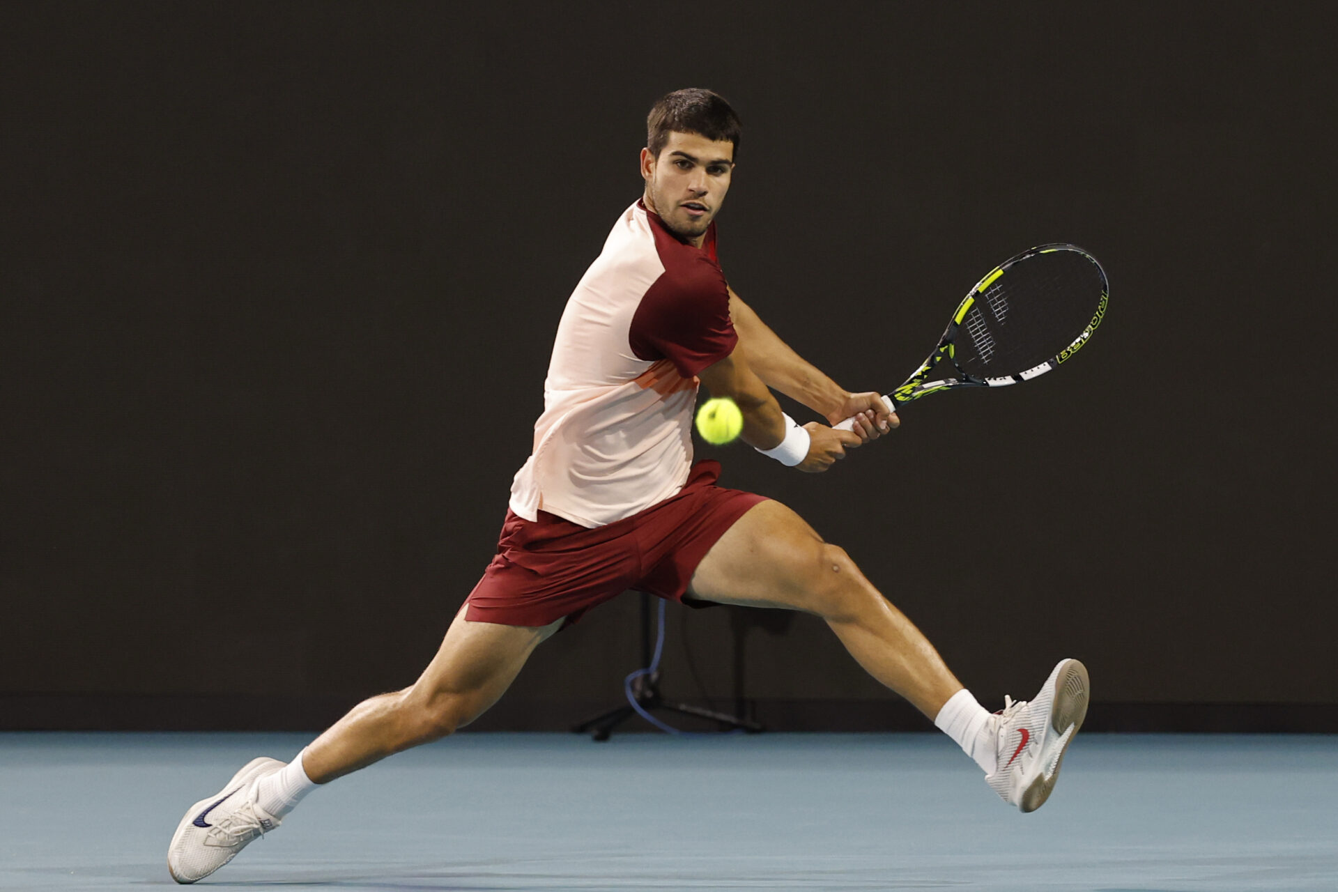 Mar 21, 2025; Miami, FL, USA; Carlos Alcaraz (ESP) reaches for a backhand against David Goffin (BEL)(not pictured) on day four of the Miami Open at Hard Rock Stadium.