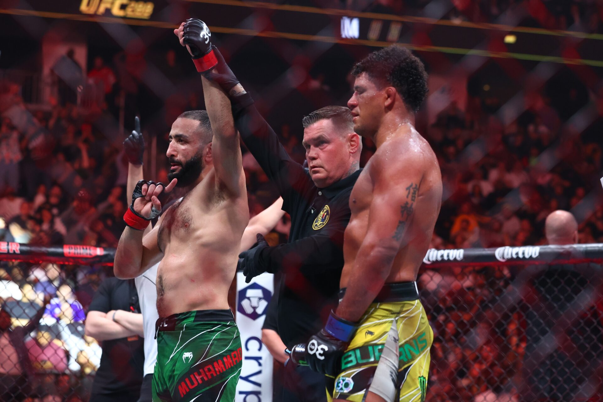 May 6, 2023; Newark, New Jersey, USA; Belal Muhammad (red gloves) reacts after defeating Gilbert Burns (blue gloves) during UFC 288 at Prudential Center. Mandatory