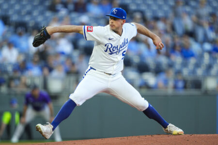 Apr 22, 2025; Kansas City, Missouri, USA; Kansas City Royals starting pitcher Kris Bubic (50) pitches during the first inning against the Colorado Rockies at Kauffman Stadium.