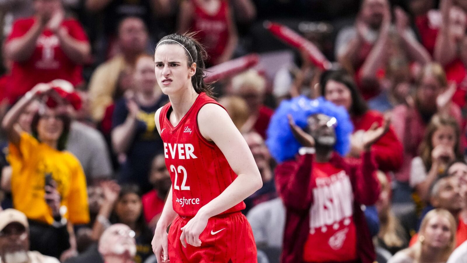 May 17, 2025; Indianapolis, IN, USA; Indiana Fever guard Caitlin Clark (22) reacts to scoring a 3-pointer Saturday, May 17, 2025, during a game between the Indiana Fever and the Chicago Sky at Gainbridge Fieldhouse in Indianapolis. The Indiana Fever defeated the Chicago Sky, 93-58.