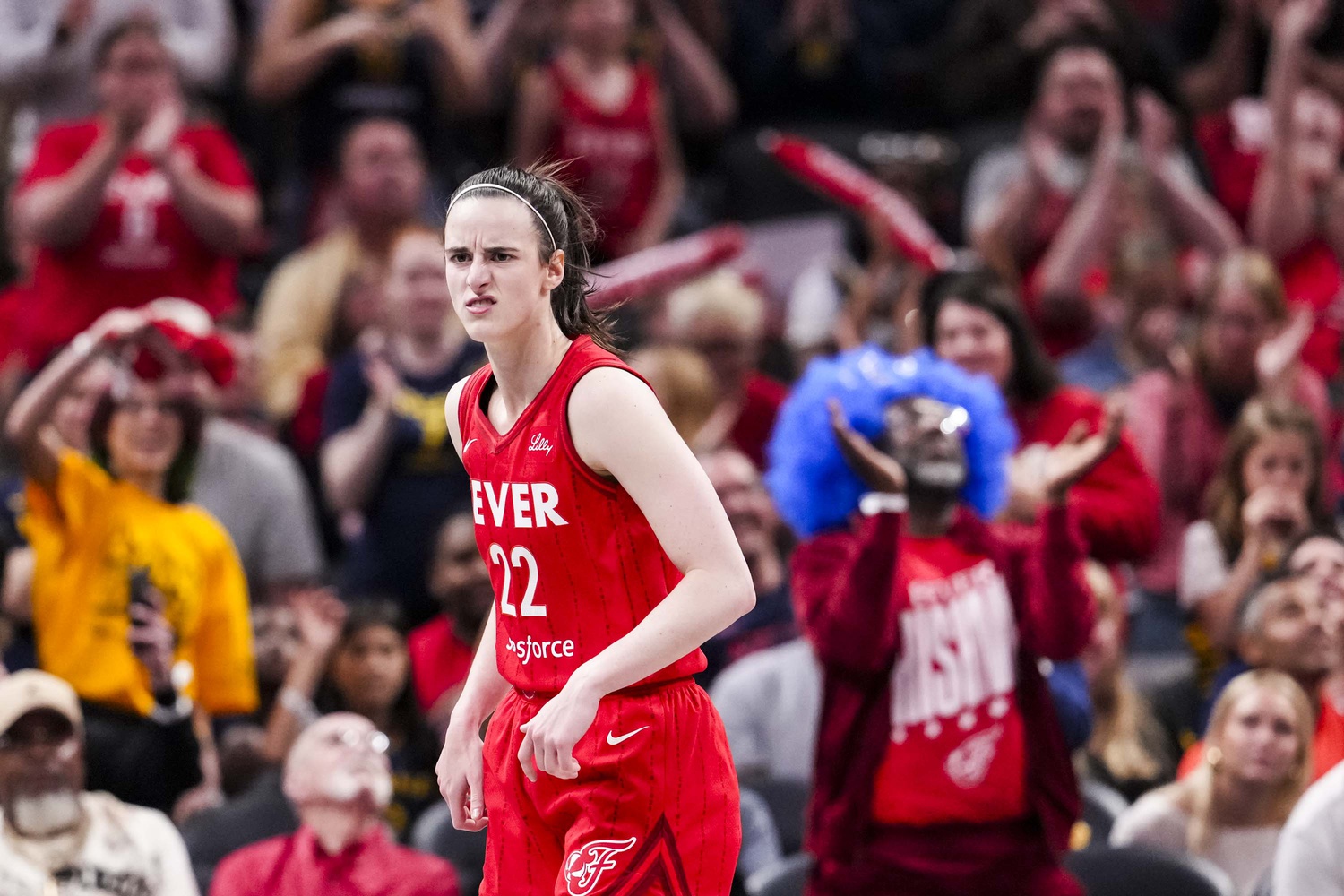 May 17, 2025; Indianapolis, IN, USA; Indiana Fever guard Caitlin Clark (22) reacts to scoring a 3-pointer Saturday, May 17, 2025, during a game between the Indiana Fever and the Chicago Sky at Gainbridge Fieldhouse in Indianapolis. The Indiana Fever defeated the Chicago Sky, 93-58.