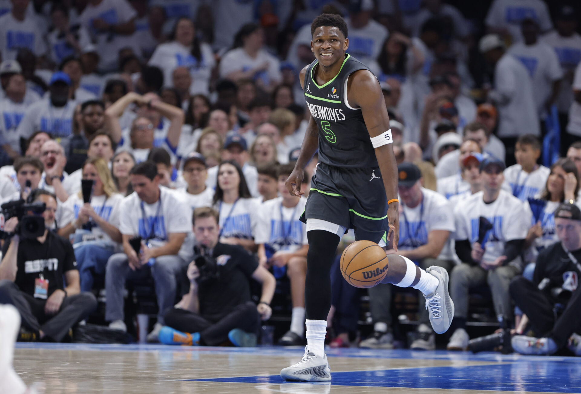 May 20, 2025; Oklahoma City, Oklahoma, USA; Minnesota Timberwolves guard Anthony Edwards (5) dribbles against the Oklahoma City Thunder in the second quarter during game one of the western conference finals for the 2025 NBA Playoffs at Paycom Center.