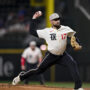 May 16, 2025; Arlington, Texas, USA; Texas Rangers starting pitcher Nathan Eovaldi (17) pitches against the Houston Astros during the first inning at Globe Life Field.