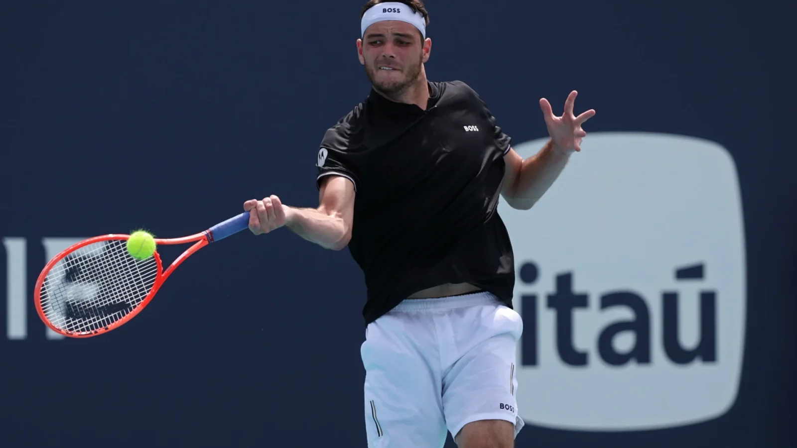 Taylor Fritz (USA) hits a forehand against Denis Shapovalov (CAN)(not pictured) on day seven of the Miami Open at Hard Rock Stadium.