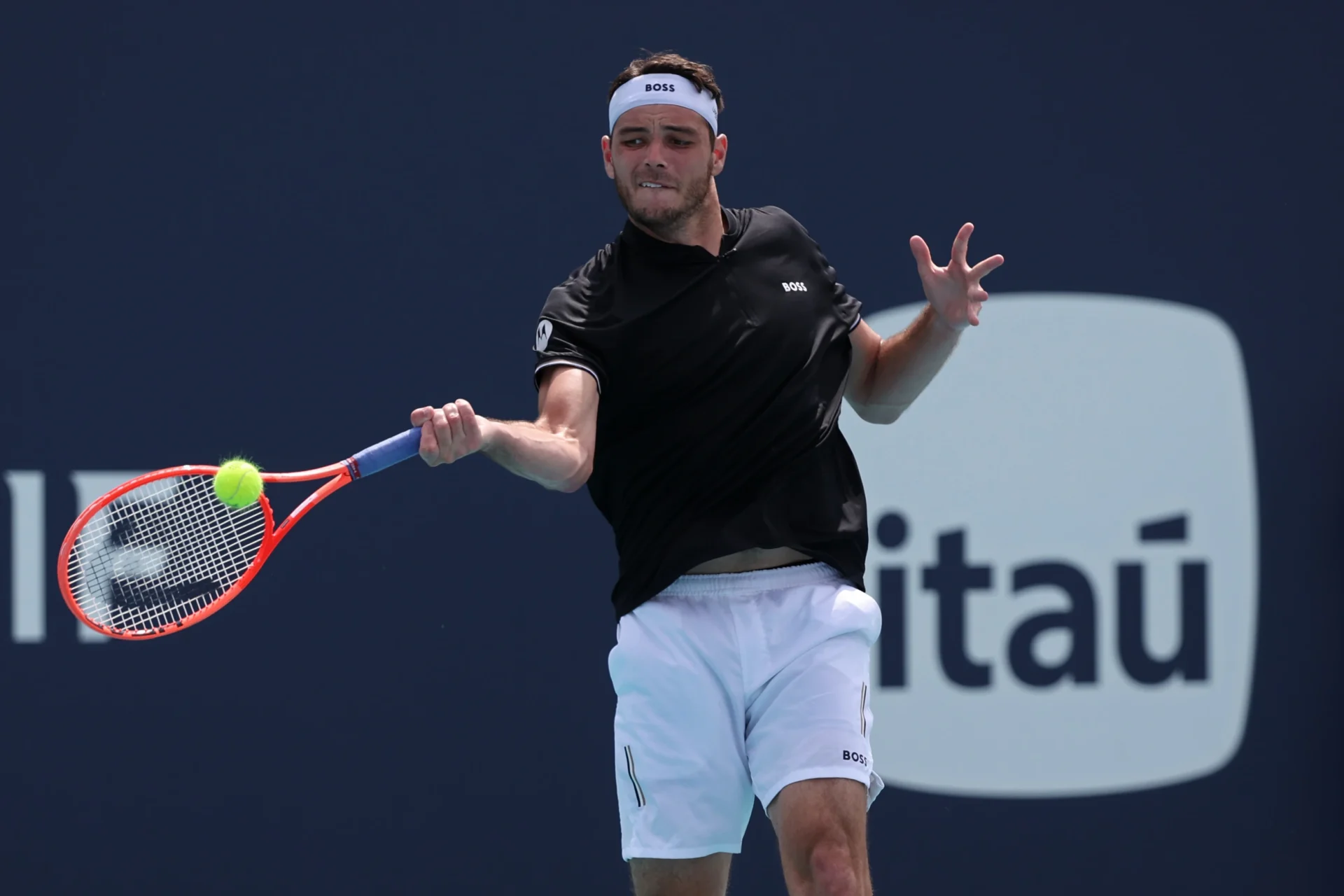 Taylor Fritz (USA) hits a forehand against Denis Shapovalov (CAN)(not pictured) on day seven of the Miami Open at Hard Rock Stadium.